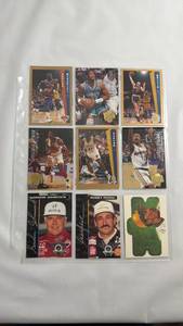 lot 101 image: 1990s Fleer Basketball and Racing Card Collection in Sleeve Pages