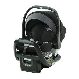 lot 1304 image: $240 Graco SnugRide SnugFit DLX Infant Car Seat, Spencer