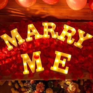 lot 276 image: Roowest Marry Me Letters Light Proposal Decorations Set Includes 7 LED 6.3 x 5.5 Romantic Marry Me Sign and 1000 Rose Petals for Proposal Engagement Wedding Decor(Yellow Light, Red) - Retail $30