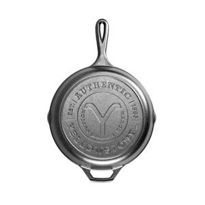 lot 437 image: Lodge Pre-Seasoned Yellowstone Stamped Cast Iron Cookware - Signature Teardrop Handle - Use in the Oven, on the Stove, on the Grill, or Over a Campfire - 10.25 Inch Logo Skillet - Retail $25