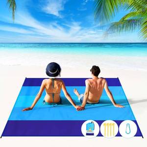lot 599 image: BYDOLL Beach Blanket 78�81 4-7 Adults Oversized Lightweight Waterproof Sandproof Beach Blanket Large Picnic Mat for Travel Camping Hiking Picnic(78 X 81, Blue-Mixed) - Retail $20