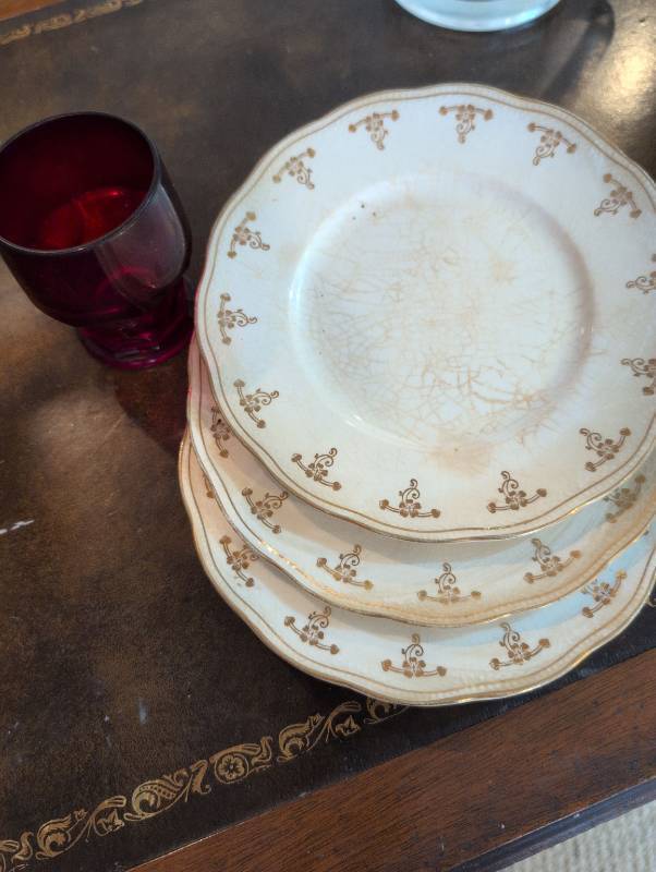lot 2634 image: Elegant White saucers with Ruby Glass