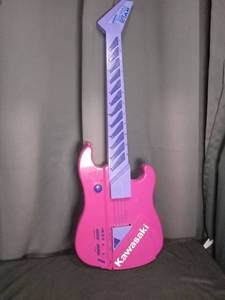 lot 3898 image: Kawasaki Pink Electronic Digital Guitar