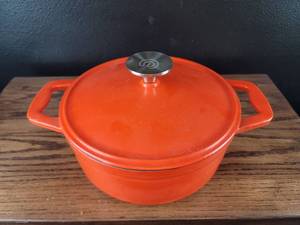 lot 3672 image: Orange Cast Iron Dutch Oven with Lid and Steaming Rack
