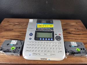 lot 3676 image: Brother P-Touch Label Maker with Extra White Tape Cartridges