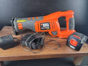 lot 3693 image: Black & Decker Firestorm 14.4V Cordless Reciprocating Saw with Battery and Charger