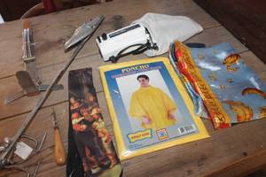 lot 4155 image: Clothes Steamer untested, NIP Rain Poncho & More