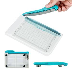lot 45259 image: Small Paper Cutter 6 inch Cut Length, Non Slip Paper Trimmer Compact and Portable Curved Strip Cutters for Cutting Coupon Craft Card and Photo (White) - Retail $20