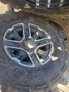 lot 61 image: Polaris side by side or utility vehicle tire and wheels set of 4
