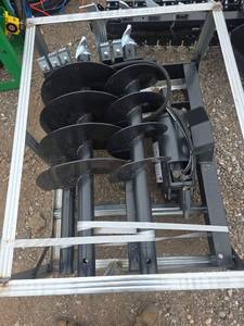 lot 216 image: Hydraulic Auger Attachment for Skid Steer