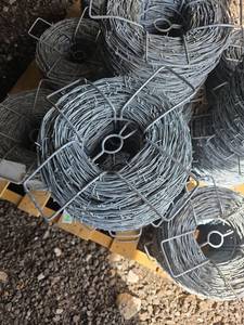 lot 255 image: Galvanized Barbed Wire Fencing Lot is for 2 Rolls