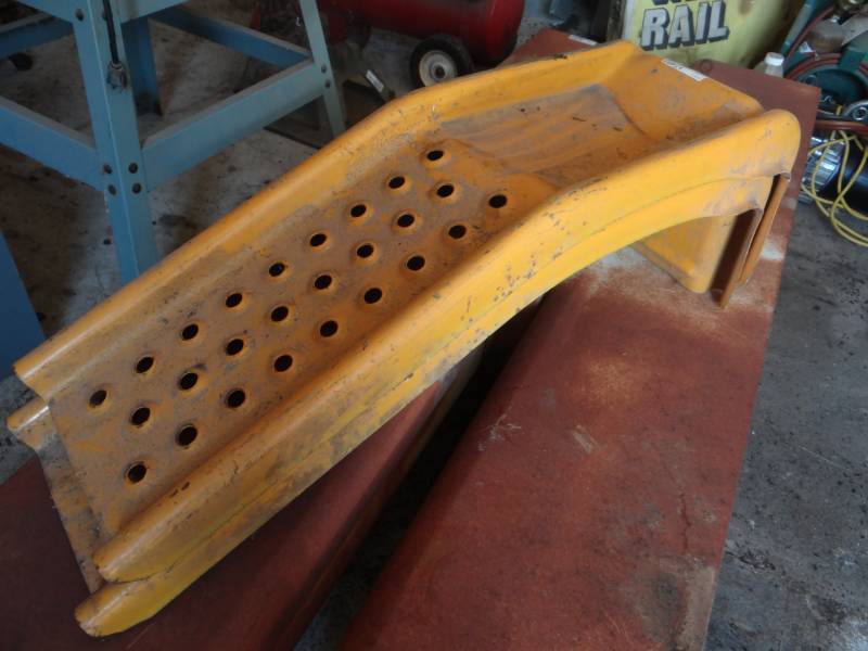 lot 17402 image: Set of metal car ramps.