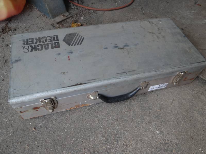 lot 17409 image: Black & decker metal box wheavy duty hammer drill & blades & drill bits.
