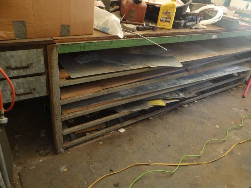 lot 17446 image: Heavy duty metal work bench table, Contents not included.