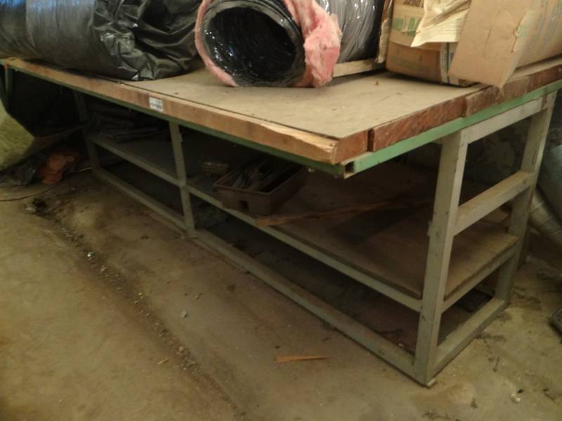 lot 17467 image: Metal table wwood top, contents not included.
