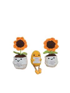 lot 32731 image: Handmade Crochet Sunflower Pots and Duck Set