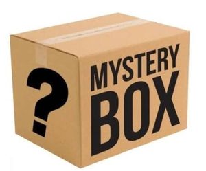 lot 32773 image: Mystery Box of Calendars, Christmas Supplies, and iPad Screen Protectors