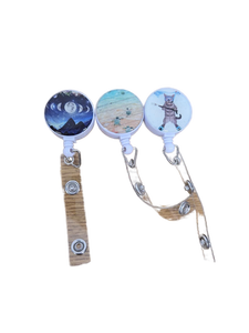 lot 32970 image: Retractable Badge Reels with Decorative Design Covers, 7 Count
