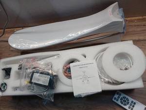 lot 30855 image: Ceiling fan with integrated light- Retail $100