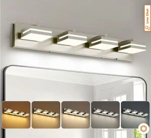 lot 30902 image: 26.77 in. 4-Light Nickel LED Vanity Light with 5-CCT Adjustable Switch and Acrylic Lampshade - Retail $106