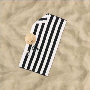 lot 35156 image: Better Homes & Gardens Rich Black Cabana 4-Pack 38 x 72 Reversible Beach Towels
