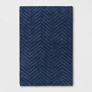 lot 15844 image: Pillowfort Tufted Cotton Chevron Kids Rug Navy (4x56) - Retail $55