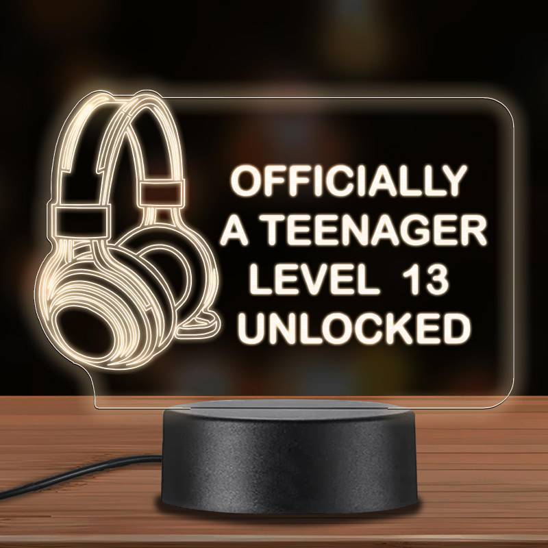 lot 7965 image: Officially A Teenager Level 13 Unlocked 3D Headphone-Shaped Light Sign