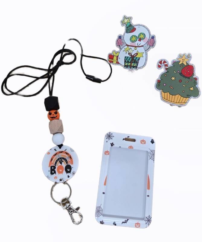 lot 32043 image: Holiday Badge Reel and Halloween Lanyard Set