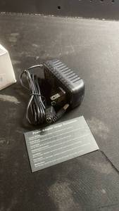 lot 12169 image: Universal AC Power Adapter with Usage Guidelines