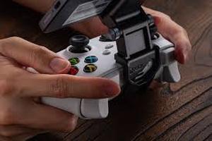 lot 12205 image: 8BitDo Mobile Gaming Clip for Xbox Wireless Controllers