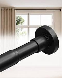 lot 1410 image: Black adjustable curtain rod