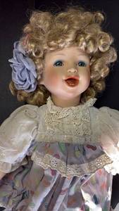lot 336 image: Kingstate The Dollcrafter Porcelain Doll (approximately 16 inches tall) in Jelly Bean Print Dress
