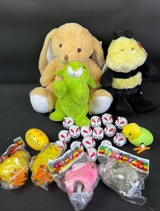 lot 344 image: Easter Bundle of Plushies, Wind Up Toys, Racing Bunnies and Busy Bee