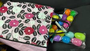 lot 351 image: Nine NIP Jumbo Hide An Eggs in Large Flower Print Reusable Bag