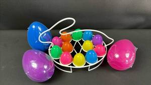 lot 356 image: Coated Wire Bunny Egg Carrier and (3) 5 inch Hide An Eggs