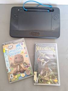 lot 53 image: uDraw GameTablet with PSP Games Bundle