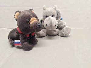 lot 89 image: Coca-Cola International Collection Plush Animals with Holographic Tags