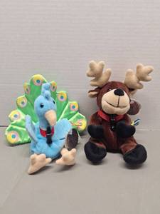 lot 90 image: Coca-Cola Collection Plush Toys Peacock and Reindeer