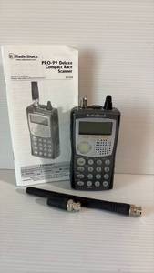 lot 401 image: RadioShack PRO-99 Deluxe Compact Race Scanner with Two Antenna and Owners Manual