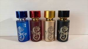 lot 402 image: Dragon Design Cologne Set - 4 Bottles of Scent for Every Occasion