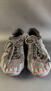 lot 432 image: Adidas Yeezy 450 in a multi-colored knit colorway. No Branding ID, Approximate Size 6