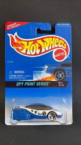 lot 445 image: Hot Wheels Alien Spy Print Series Die Cast Car in Blister Pack