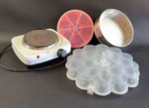 lot 461 image: Elite Electric Hot Plate, InstaPot Egg Cooker and Springform Pan with Covered Deviled Egg Container.