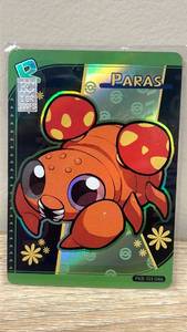 lot 10 image: Pokemon Paras Holographic Trading Card with .999 GR Silver