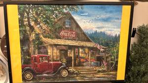 lot 26 image: Framed Coca-Cola Country Store Puzzle Art