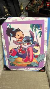 lot 77 image: Disney Lilo and Stitch Framed Art Print