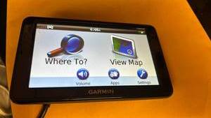 lot 85 image: Garmin GPS Navigation System with Car Charger