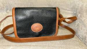 lot 87 image: Black Leather Crossbody Bag with Brown Trim