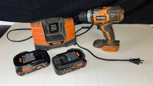 lot 90 image: RIDGID 18V Cordless Drill Driver Set with Batteries and Charger