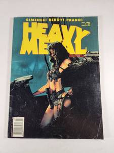 lot 196 image: Heavy Metal Magazine July 1995 Issue with 1996 Calendar Advertisement